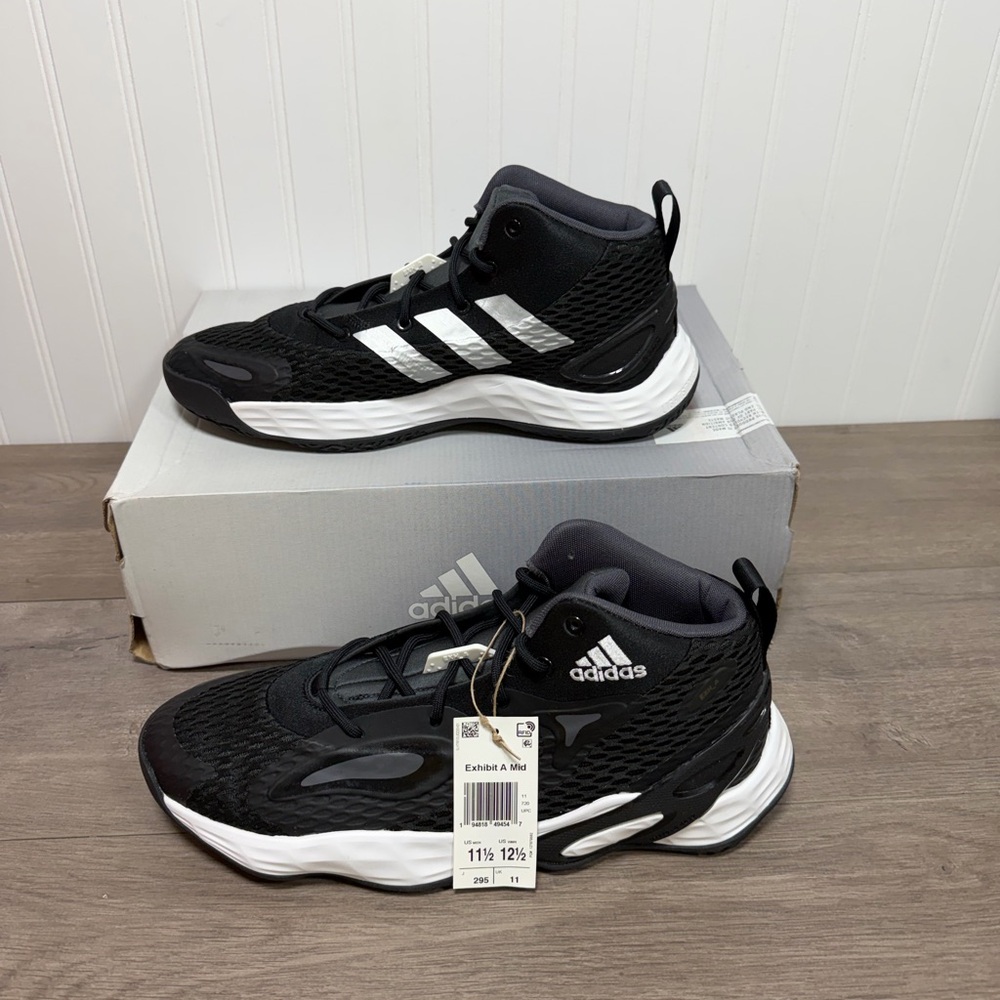 Brand new men’s Adidas Exhibit A Mid sneakers. Size 11.5